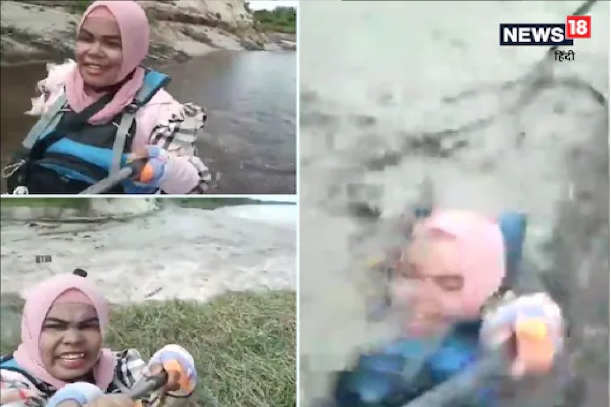 जीवापेक्षा सेल्फी हवा! पुरात बुडाली तरी पाण्याबाहेर हात ठेवून शूट करत राहिली VIDEO