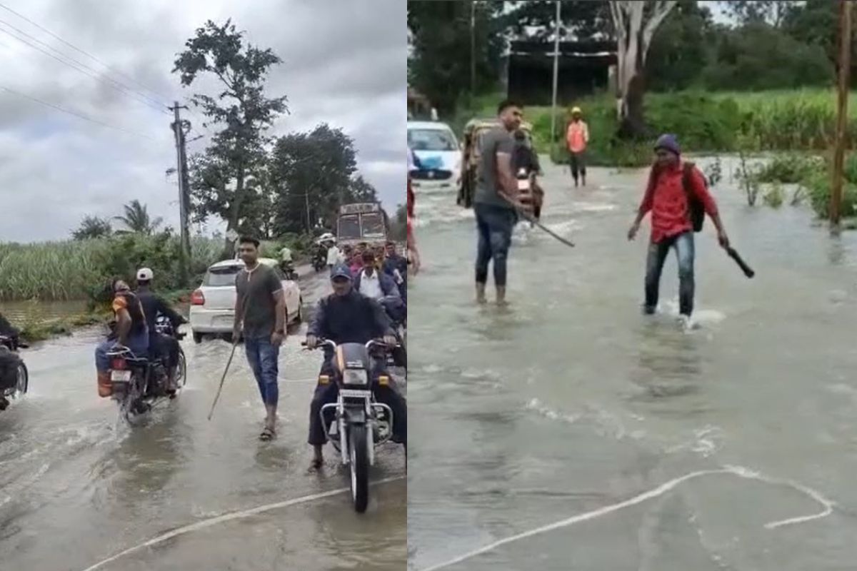 पुराच्या पाण्यातून जाणाऱ्यांच्या अंगावर कोल्हापूरकरांनी काठीने पाडला 'पाऊस'; पाहा VIDEO