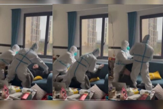 अधिकाऱ्यांनी कोरोना रुग्णाला पायाला धरून ओढत नेलं; Viral Video मुळे उडाली खळबळ