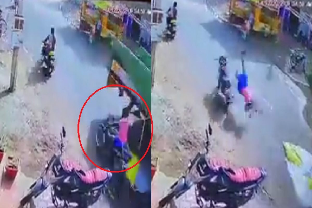 ट्रकच्या दोरीत अडकला बाईकस्वार.