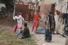 VIDEO: ...अन् सगळ्यांसमोरच पत्नीने पतीला काठीनं बदडलं; सासूनेही दिली साथ VIDEO: ...अन् सगळ्यांसमोरच पत्नीने पतीला काठीनं बदडलं; सासूनेही दिली साथ