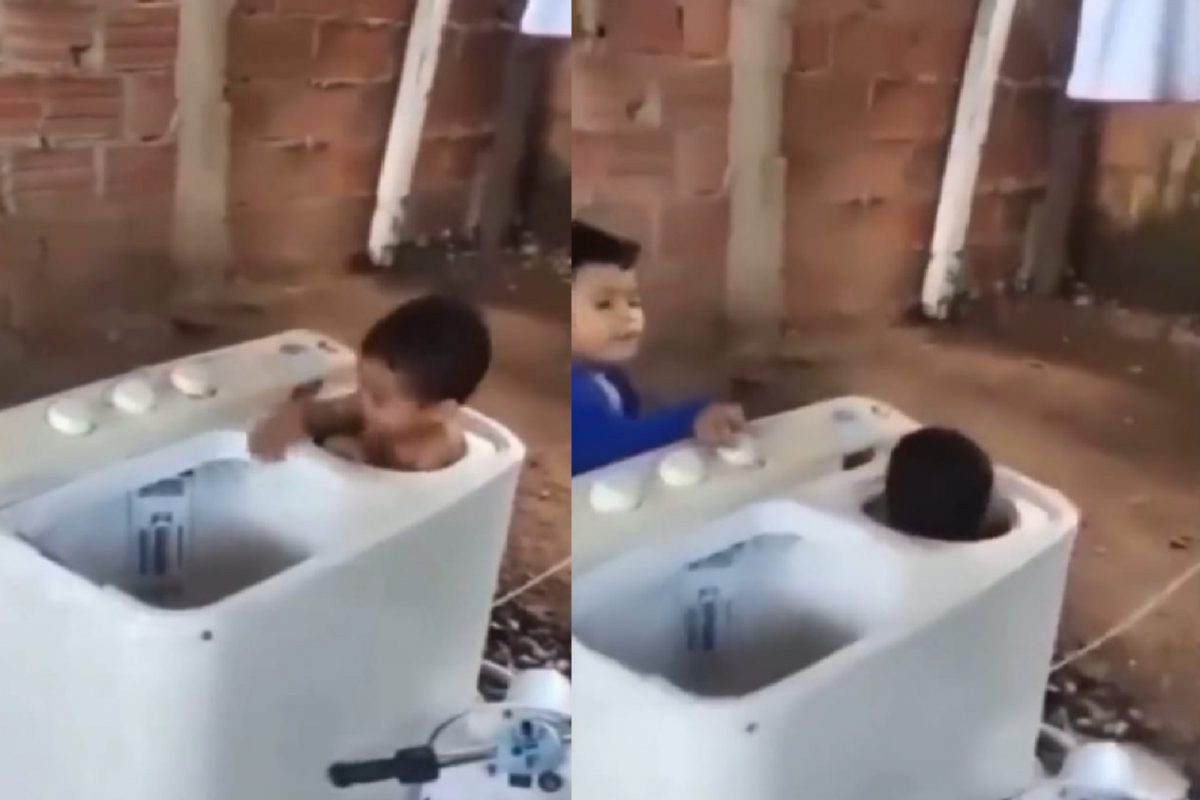 वॉशिंग मशीनमध्ये चिमुकला (फोटो - ट्विटर व्हिडीओ ग्रॅब)