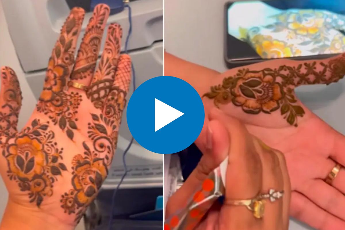 विमानातच मेहंदी काढू लागली महिला