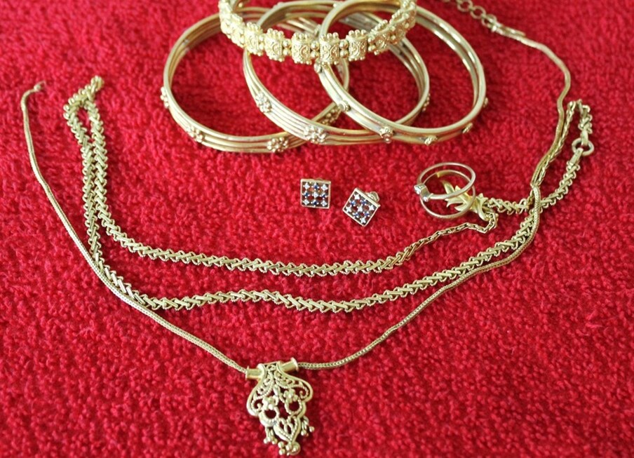 Remove it before bathing : Some people go to bath wearing jewelry around their neck.  Doing so will also damage the jewelry.  Also, the soap or body wash chemicals you use can affect the jewelry.  So it is better to take bath after removing heavy earrings and necklaces.