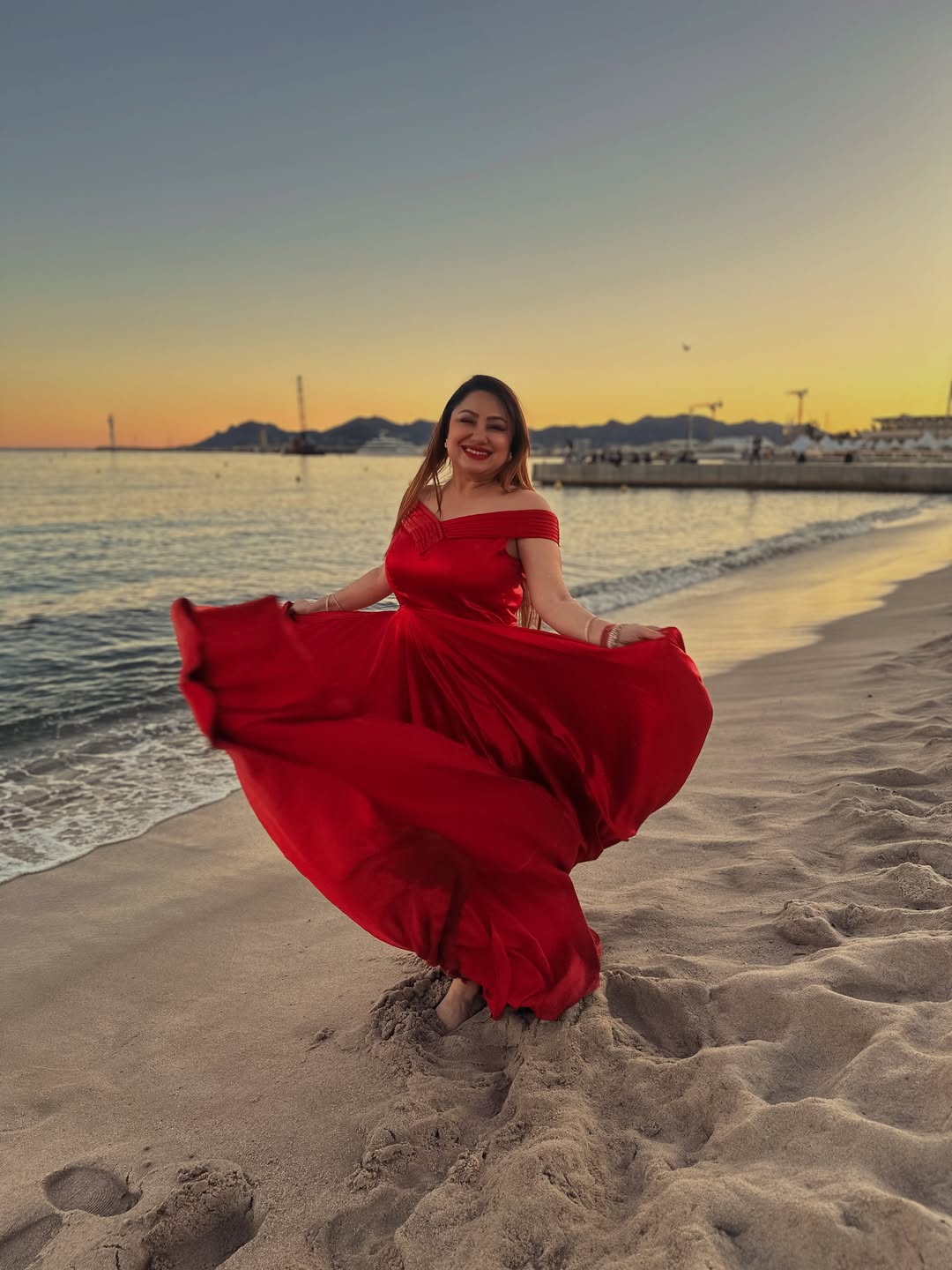 priyanka upendra, priyanka upendra latest photos, priyanka upendra photos, priyanka upendra in French Riviera, priyanka upendra in cannes 2026, priyanka upendra french riviera red gown photos share on social media, ಪ್ರಿಯಾಂಕಾ ಉಪೇಂದ್ರ, ಪ್ರಿಯಾಂಕಾ ಇನ್ ಕಾನ್ಸ್, ಪ್ರಿಯಾಂಕಾ ಇನ್ ಫ್ರೆಂಚ್ ರಿವೇರಿಯಾ, ಪ್ರಿಯಾಂಕಾ ಉಪೇಂದ್ರ ಫೋಟೋಸ್