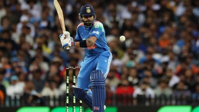 Cricket - One Day International - Australia v India - Sydney Cricket Ground, Sydney, Australia - October 25, 2025 India's Virat Kohli in action as he hits four runs off the bowling of Australia's Mit