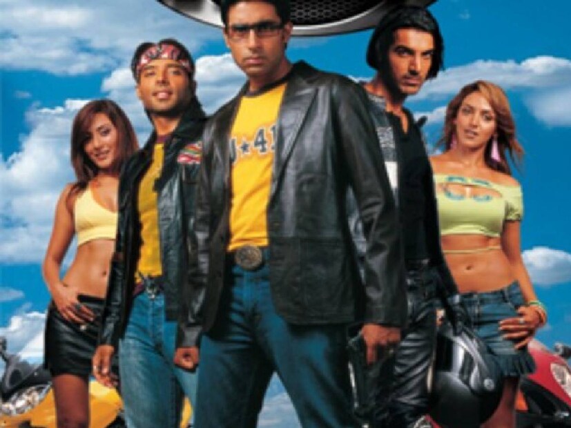  2004ൽ ആയിരുന്നു ധൂം പരമ്പരയിലെ ആദ്യ ചിത്രം പുറത്തിറങ്ങുന്നത്. സഞ്ജയ് ഗാധ്വി സംവിധാനം ചെയ്ത ചിത്രത്തിൽ അഭിഷേക് ബച്ചൻ, ഉദയ് ചോപ്ര , ജോൺ എബ്രഹാം എന്നിവരായിരുന്നു പ്രധാന കഥാ പാത്രങ്ങളെ അവതരിപ്പിച്ചത്. ജോൺ എബ്രാഹാമായിരുന്നു ചിത്രത്തിലെ പ്രധാന കഥാപാത്രമായ വില്ലൻ വേഷത്തെ അവതരിപ്പിച്ചത്. എസിപി ജയ് ദീക്ഷിത് എന്ന കഥാപാത്രമായാണ് അഭിഷേക് ബച്ചൻ സിനിമയിൽ തിളങ്ങിയത്. സബ് ഇൻസ്പെക്ടർ അലി അക്ബറായാണ് ഉദയ് ചോപ്ര എത്തിയത്.