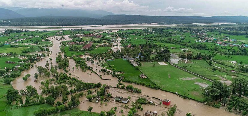  ശക്തമായ മഴയെ തുടർന്ന് വെള്ളപ്പൊക്കത്തിലായ ഡെറാഡൂണിലെ ഗൗഹരി ഗ്രാമത്തിന്റെ ആകാശക്കാഴ്ച(ചിത്രം-പിടിഐ)