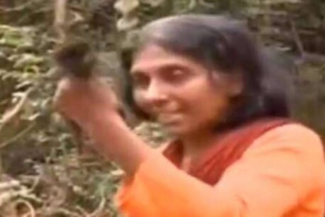 ശാന്തിവനത്തിലെ മരങ്ങളുടെ ശിഖരം മുറിച്ചതിനെതിരെ മുടി മുറിച്ച് മീനയുടെ പ്രതിഷേധം ശാന്തിവനത്തിലെ മരങ്ങളുടെ ശിഖരം മുറിച്ചതിനെതിരെ മുടി മുറിച്ച് മീനയുടെ പ്രതിഷേധം