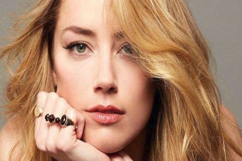  അമ്പര്‍ ഹേർഡ്- അടുത്തിടെ പുറത്തിറങ്ങിയ അക്വാമാൻ എന്ന സിനിമയിലെ നായിക. ബ്യൂട്ടി ഫൈയുടെ സുവർണ്ണ അനുപാതം അനുസരിച്ച്നീലക്കണ്ണുള്ള അമേരിക്കൻ നടി. ഡോ. ജൂലിയൻ ഡി സിൽവയുടെ പട്ടികയിൽ ഇടംനേടി.