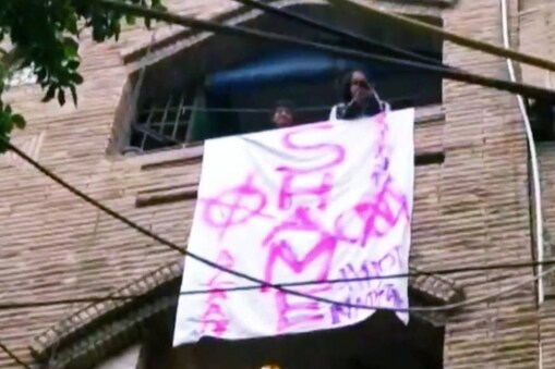 anti caa banner in amit shah rally