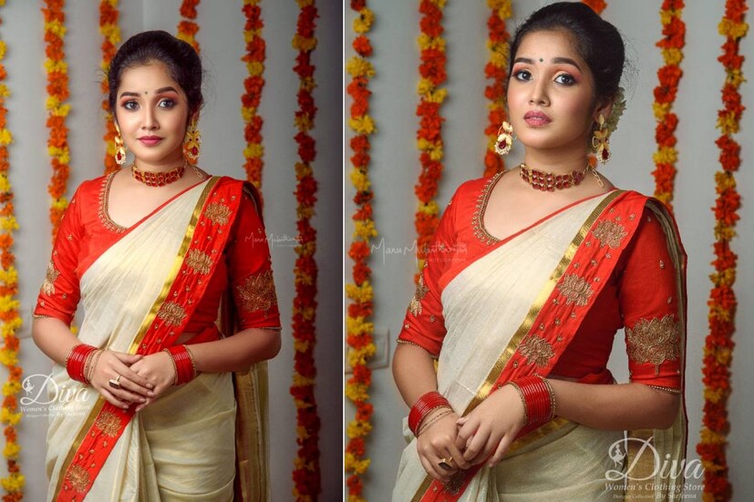 ഓണപ്പുടവയിൽ തിളങ്ങി അനിഖ സുരേന്ദ്രൻ. ചുവപ്പ് കരയുള്ള, താമരയുടെ മോടിഫ് വച്ച് ഹാൻഡ്വർക് ചെയ്തിട്ടുള്ള ടിഷ്യൂ സെറ്റ് സാരിയാണ് അനിഖ അണിഞ്ഞിരിക്കുന്നത്. സെലിബ്രിറ്റി ഫോട്ടോഗ്രാഫർ മനു മുളന്തുരുത്തിയാണ് ചിത്രങ്ങൾ പകർത്തിയത് ഓണപ്പുടവയിൽ തിളങ്ങി അനിഖ സുരേന്ദ്രൻ. ചുവപ്പ് കരയുള്ള, താമരയുടെ മോടിഫ് വച്ച് ഹാൻഡ്വർക് ചെയ്തിട്ടുള്ള ടിഷ്യൂ സെറ്റ് സാരിയാണ് അനിഖ അണിഞ്ഞിരിക്കുന്നത്. സെലിബ്രിറ്റി ഫോട്ടോഗ്രാഫർ മനു മുളന്തുരുത്തിയാണ് ചിത്രങ്ങൾ പകർത്തിയത്