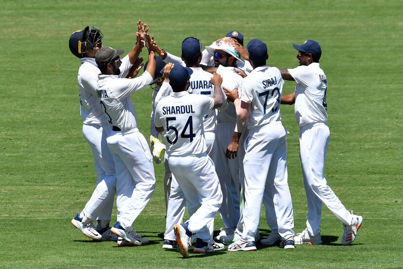 India celebrate the fall of a wicket. 