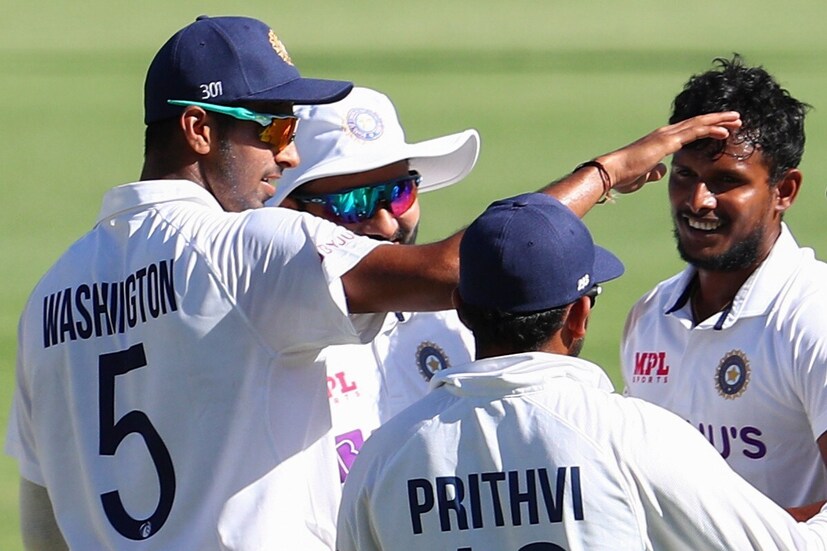 T Natarajan (R) celebrates a wicket. 