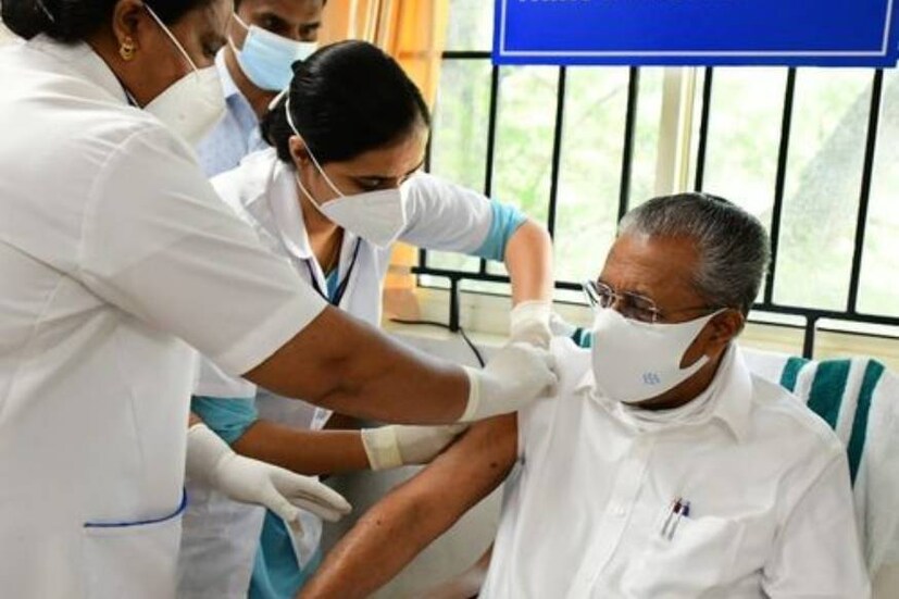 Pinarayi Vijayan receives Covid vaccine, KK Shailaja in the photo row, KK Shailaja, Shailaja vaccination, Covid vaccine