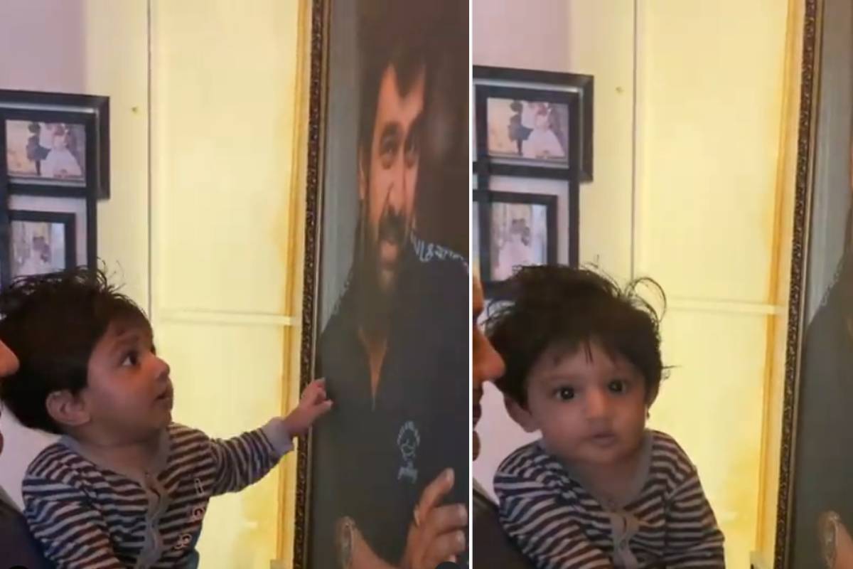  മേഘ്ന രാജും മകനും ചിരഞ്ജീവി സർജ്ജയുടെ ചിത്രത്തിനരികിൽ (ഇൻസ്റ്റഗ്രാം)