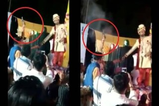 Video grab of bride firing shots in the air. (Credit: Twitter) Video grab of bride firing shots in the air. (Credit: Twitter)
