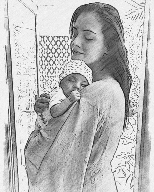 Dia Mirza enjoys a peaceful moment with son Avyaan. 