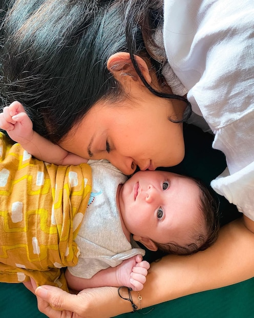 Kishwer Merchantt plants a kiss on son Nirvair.