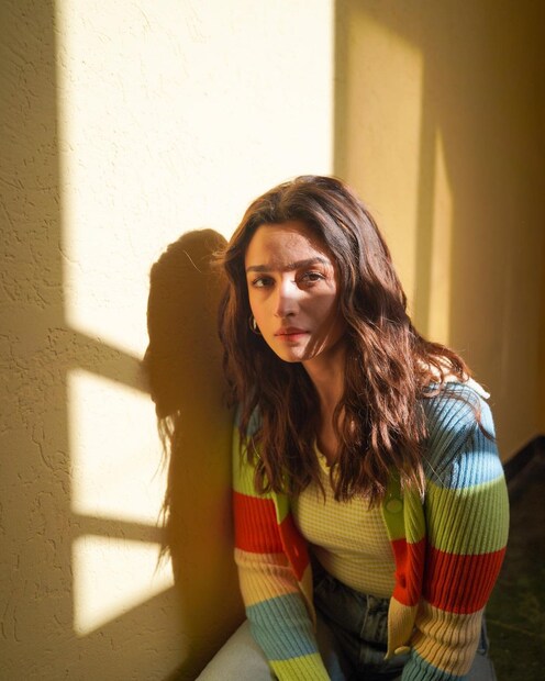 Alia Bhatt looks lovely in a multicoloured knitwear top.
