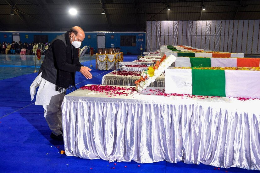 Defence Minister Rajnath Singh pays tribute to late Chief of Defense Staff (CDS) General Bipin Rawat, during a wreath laying ceremony at Palam Airbase in New Delhi. (pti)