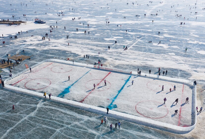 An aerial view shows a hockey rink after a match on the ice of Lake Baikal, organized to draw attention to the environmental problems of the lake, in the village of Bolshoye Goloustnoye in Irkutsk region, Russia, on March 8. (Image: REUTERS/Maxim Shemetov)