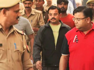 Ashish Mishra (in black)  (PTI/File Photo)