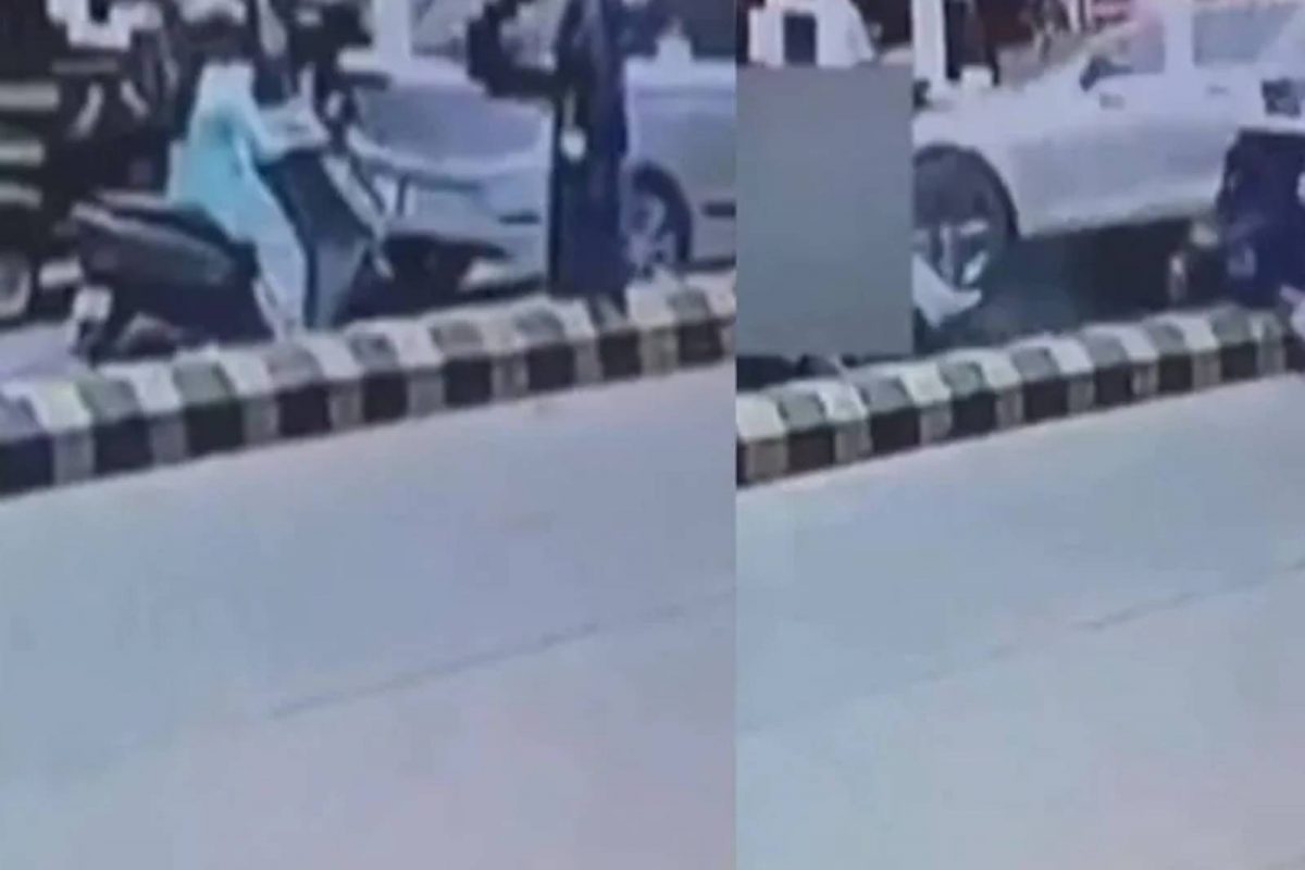 ഇടിയുടെ ആഘാതത്തില്‍ പിന്നിലുള്ള മറ്റൊരു കാറിനടിയിലേക്കാണ് യുവതിയും സ്‌കൂട്ടറും തെറിച്ചുവീണത്.
