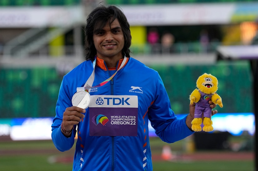 India’s Neeraj Chopra poses with the silver medal at the World Athletics Championships in the USA (AP Photo)