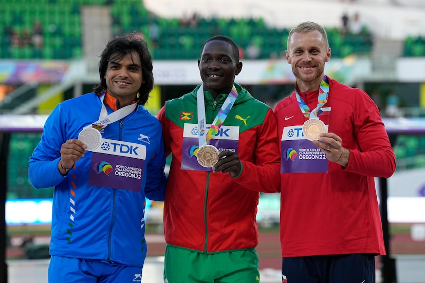 Gold medalist Anderson Peters, of Grenada, stands with Neeraj Chopra and Jakub Vadlejch, of the Czech Republic, during a medal ceremony (AP Photo)