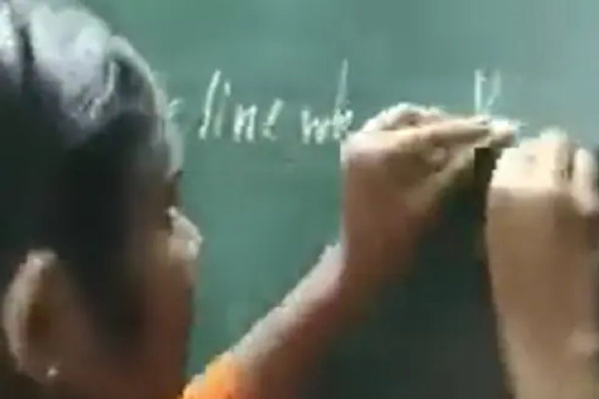 ഒരേ സമയം ഇരു കൈകൾ കൊണ്ടുമെഴുതുന്ന പെൺകുട്ടി; ലോക റെക്കോർഡിന് ഉടമ; വൈറൽ വീഡിയോ