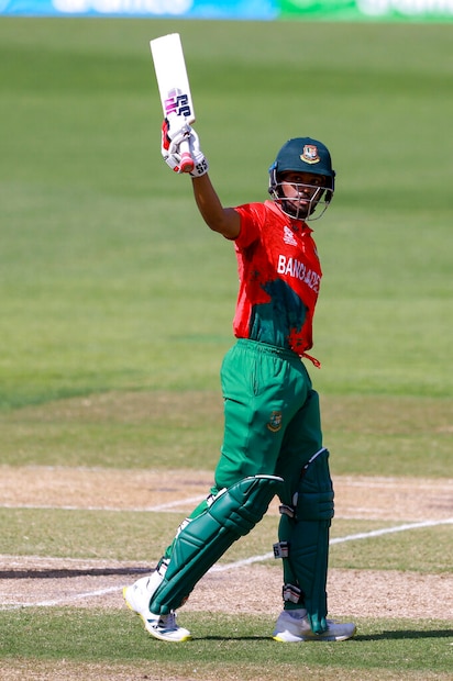 najmul shanto raises bat after scoring fifty