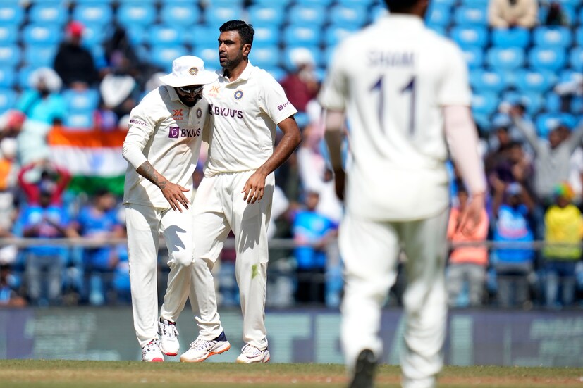 India's Ravichandran Ashwin, second left, celebrates the wicket of Australia's cricket captain Pat Cummins with his team player India's Ravindra Jadeja, during the first day of the first cricket test match between India and Australia in Nagpur, India, Thursday, Feb. 9, 2023. (AP Photo)
