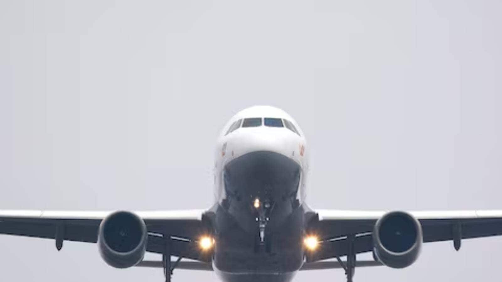 Argument between employees over seat;  The flight was delayed by an hour