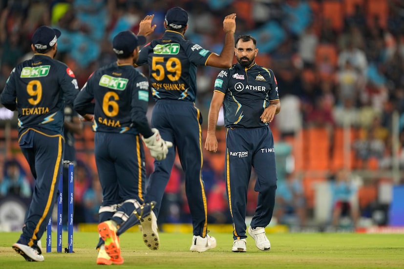 Gujarat Titans' Mohammed Shami, right, celebrates with teammates the dismissal of Delhi Capitals' Rilee Rossouw during the Indian Premier League cricket match between Gujarat Titans and Delhi Capitals in Ahmedabad, India, Tuesday, May 2, 2023. (AP Photo)
