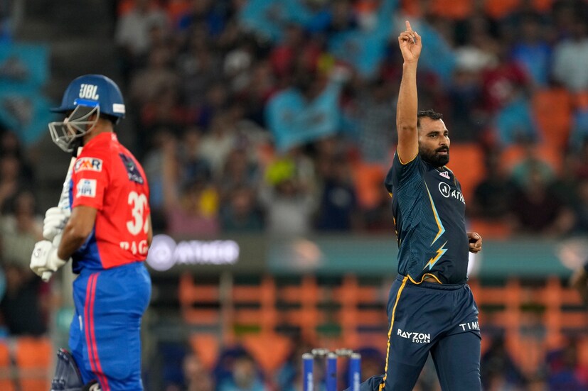 Gujarat Titans' Mohammed Shami, right, celebrates the dismissal of Delhi Capitals' Priyam Garg, left, during the Indian Premier League cricket match between Gujarat Titans and Delhi Capitals in Ahmedabad, India, Tuesday, May 2, 2023. (AP Photo)