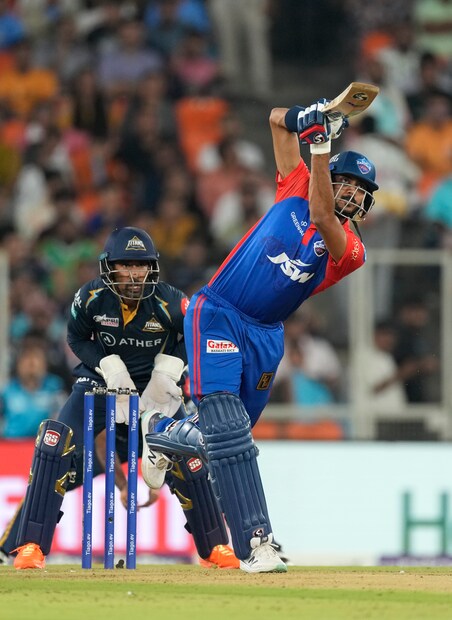 Delhi Capitals' Axar Patel plays a shot during the Indian Premier League cricket match between Gujarat Titans and Delhi Capitals in Ahmedabad, India, Tuesday, May 2, 2023. (AP Photo)