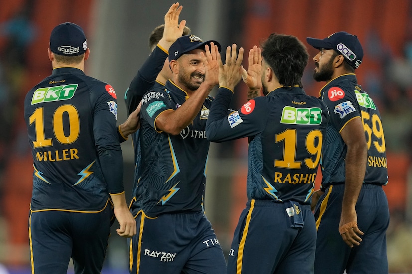 Gujarat Titans' Mohit Sharma, second left, celebrates with teammates after the dismissal of Delhi Capitals' Axar Patel during the Indian Premier League cricket match between Gujarat Titans and Delhi Capitals in Ahmedabad, India, Tuesday, May 2, 2023. (AP Photo)