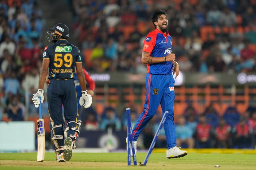 Delhi Capitals' Ishant Sharma, right, celebrates the dismissal of Gujarat Titans' Vijay Shankar, left, during the Indian Premier League cricket match between Gujarat Titans and Delhi Capitals in Ahmedabad, India, Tuesday, May 2, 2023. (AP Photo)