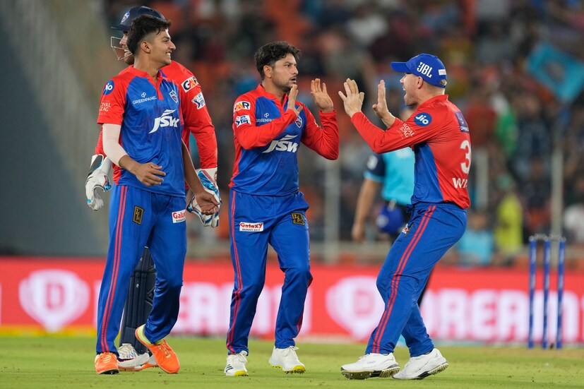 Delhi Capitals' Kuldeep Yadav, center, celebrates with teammates after the dismissal of Gujarat Titans' David Miller during the Indian Premier League cricket match between Gujarat Titans and Delhi Capitals in Ahmedabad, India, Tuesday, May 2, 2023. (AP Photo)