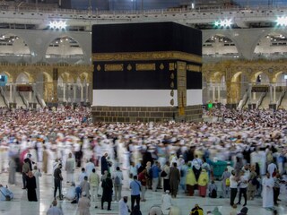 Muslim pilgrims circumambulate around the Kaaba, the cubic structure at the Grand Mosque, during the annual hajj pilgrimage, in Mecca, Saudi Arabia, Saturday, June 24, 2023. Muslim pilgrims are converging on Saudi Arabia's holy city of Mecca for the largest hajj since the coronavirus pandemic severely curtailed access to one of Islam's five pillars. (AP Photo/Amr Nabil)