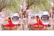 വൈറലാകാന്‍ നടുറോഡില്‍ പെരുമഴയത്ത് യുവതിയുടെ യോഗാഭ്യാസം; പിന്നാലെ പണികൊടുത്ത് പോലീസ്