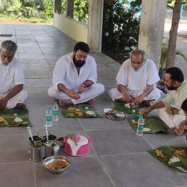  പുതിയ ചിത്രമായ എമ്പുരാന്റെ ചിത്രീകരണത്തിന്റെ ഇടവേളയിലാണ് താരം ആശ്രമ സന്ദര്‍ശനം നടത്തിയത്. ആശ്രമത്തില്‍ എത്തിയ മോഹന്‍ലാല്‍ ഗുരുജിക്കൊപ്പം ക്ഷേത്രദർശനം നടത്തുന്നതും നിലത്തിരുന്ന് ഭക്ഷണം കഴിക്കുന്നതും ഉൾപ്പെടെയുള്ള ചിത്രങ്ങളാണ് സോഷ്യൽ മീഡിയയിൽ പങ്കുവച്ചിരിക്കുന്നത്.
