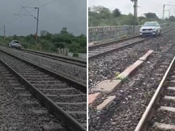 റെയില്‍വേ ജീവനക്കാര്‍ തടയാന്‍ ശ്രമിച്ചെങ്കിലും യുവതി കാര്‍ നിര്‍ത്തിയില്ല