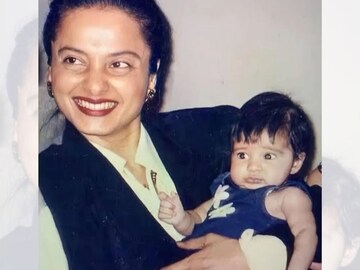 രേഖയുടെ കയ്യിലിരിക്കുന്ന കുഞ്ഞിനെ മനസിലായോ? പ്രശസ്ത നടി ആരായിരിക്കും?