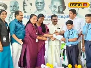 വിദ്യാർഥികൾ സമാഹരിച്ച തുക കൈമാറുന്നു 