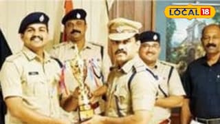 സിറ്റി പോലീസ് കമ്മിഷണറിൽ നിന്ന്  ചക്കരക്കല്ല് ഇന്‍സ്‌പെക്ടർ ട്രോഫി വാങ്ങുന്നു 