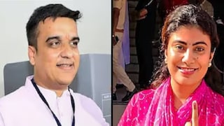 ഹർഷ് സംഘവി (ഇടത്) റിവാബ ജഡേജ (വലത്). (പിടിഐ) ഹർഷ് സംഘവി (ഇടത്) റിവാബ ജഡേജ (വലത്). (പിടിഐ)