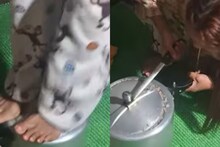 അടപ്പ് തിരിച്ചിട്ടും തുറന്നില്ല; പ്രഷർ കുക്കറിന് മുകളിൽ കയറി ചവിട്ടി തുറക്കുന്ന യുവതിയുടെ വീഡിയോ വൈറൽ