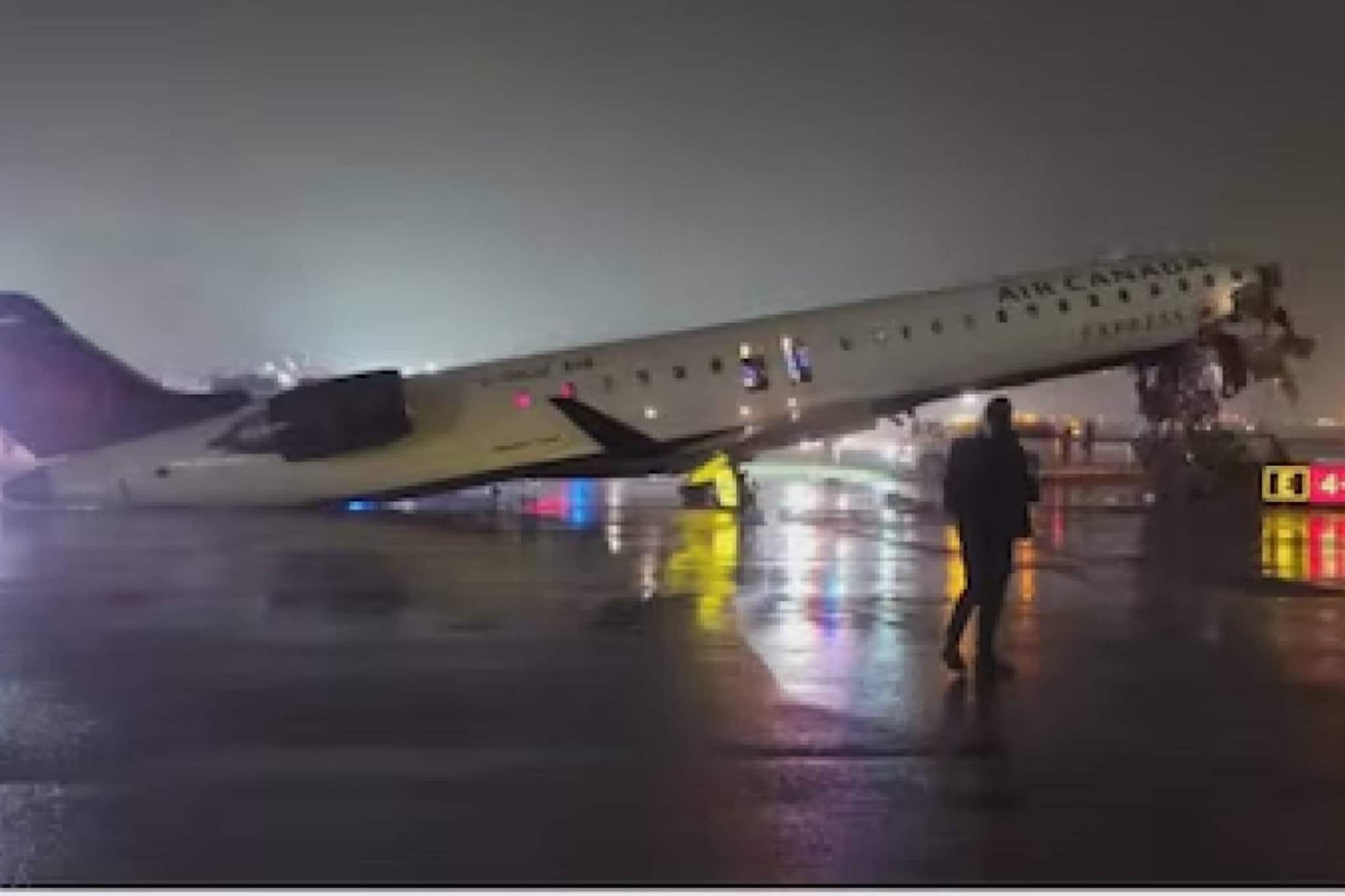 ന്യൂയോർക്കിലെ ലാഗ്വാർഡിയ വിമാനത്താവളത്തിൽ എയർ കാനഡ വിമാനം ഫയർ ട്രക്കുമായി കൂട്ടിയിടിച്ചു ന്യൂയോർക്കിലെ ലാഗ്വാർഡിയ വിമാനത്താവളത്തിൽ എയർ കാനഡ വിമാനം ഫയർ ട്രക്കുമായി കൂട്ടിയിടിച്ചു